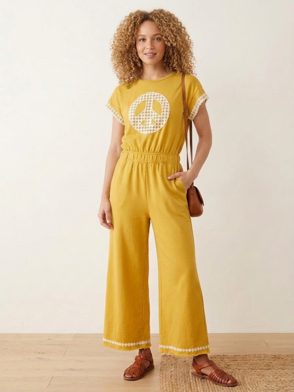 Umgee Mustard Crochet-Trim Peace Graphic Wide-Leg Jumpsuit